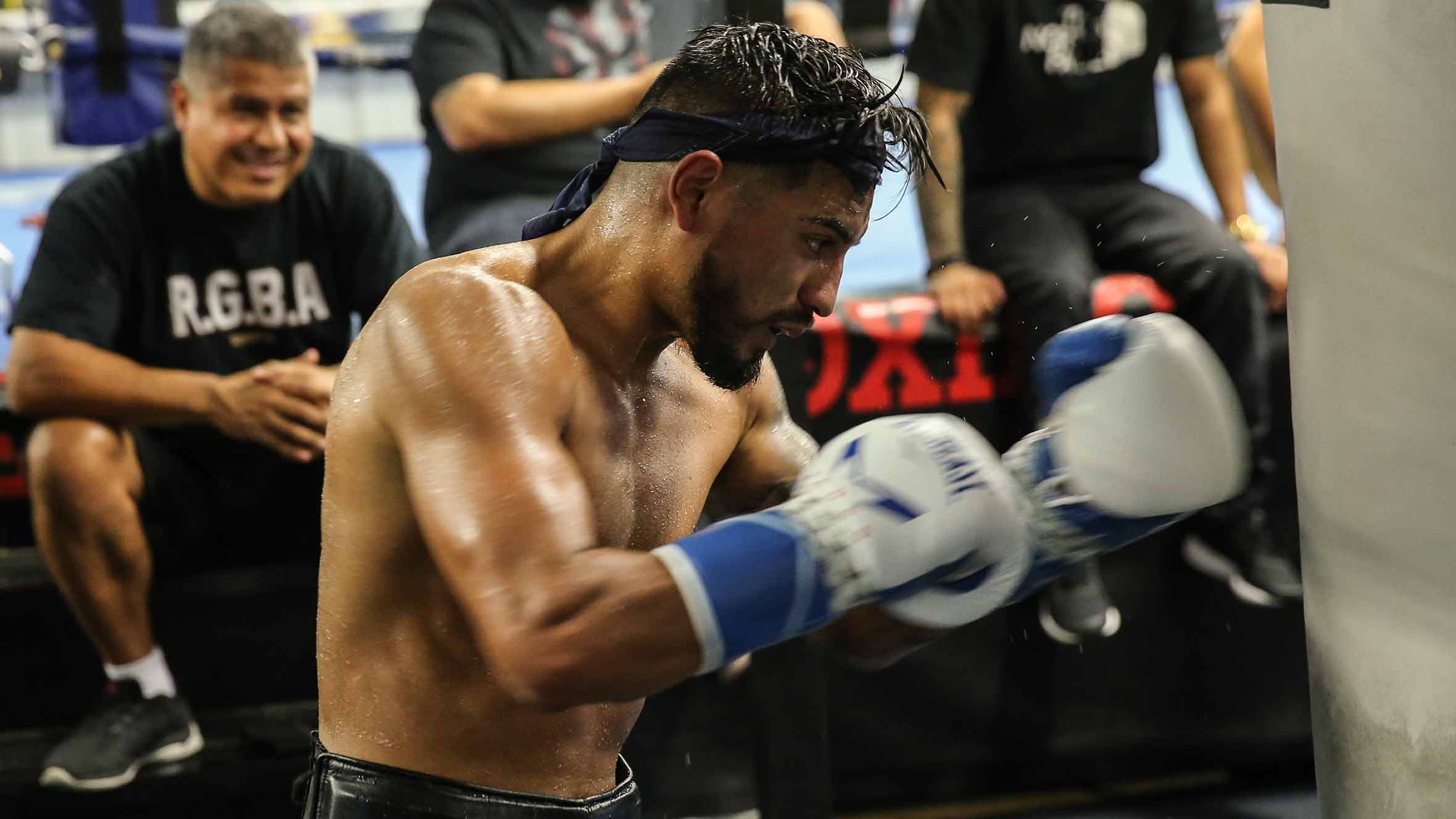 Coach Luis Garcia helps get Abner Mares ready for battle