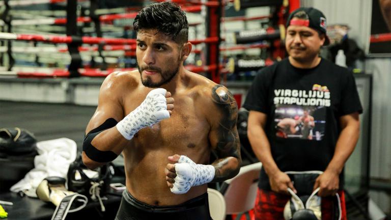 Coach Luis Garcia helps get Abner Mares ready for battle